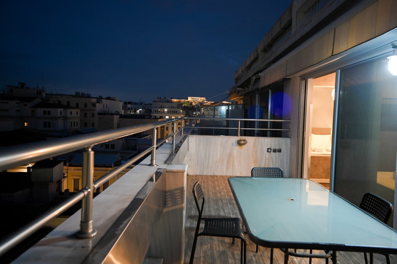 Rooftop veranda with Acropolis view at night